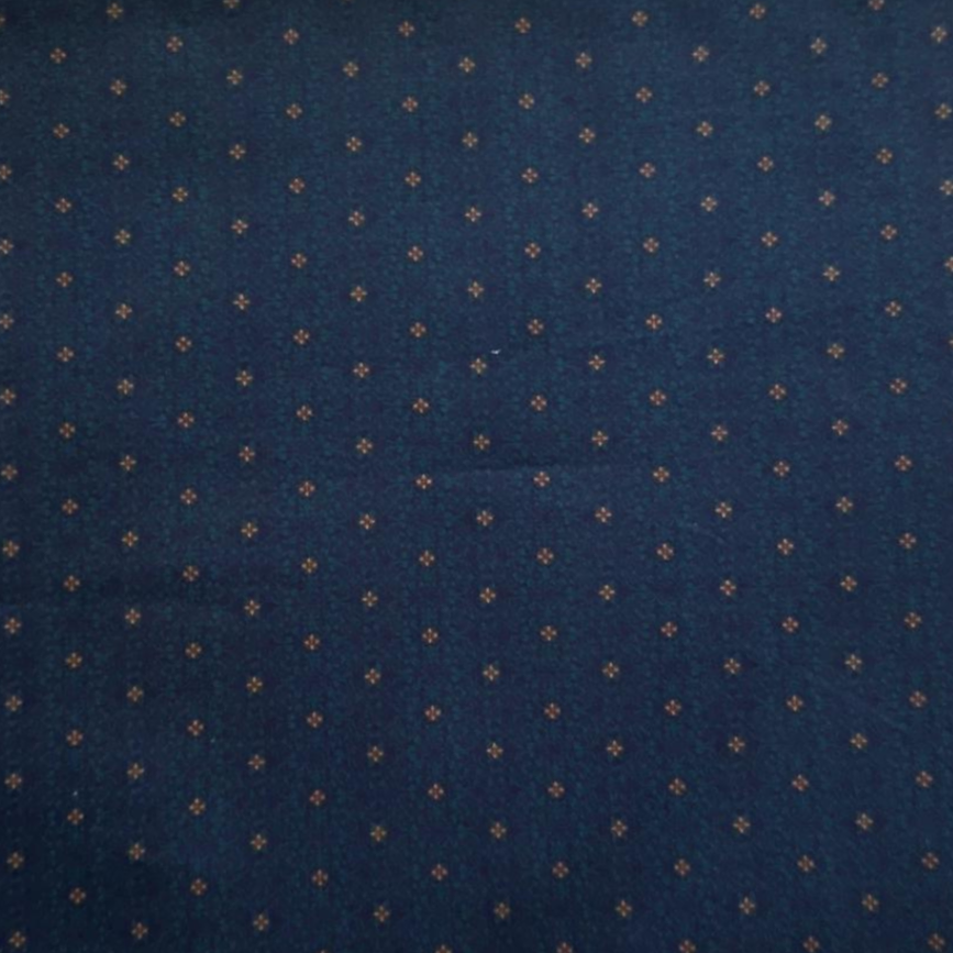 Navy blue fabric with a subtle pattern on a beige background