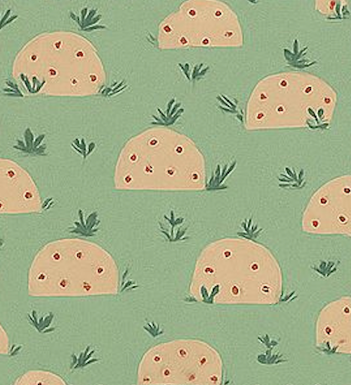 Pattern of round tan shapes with red dots on a green background