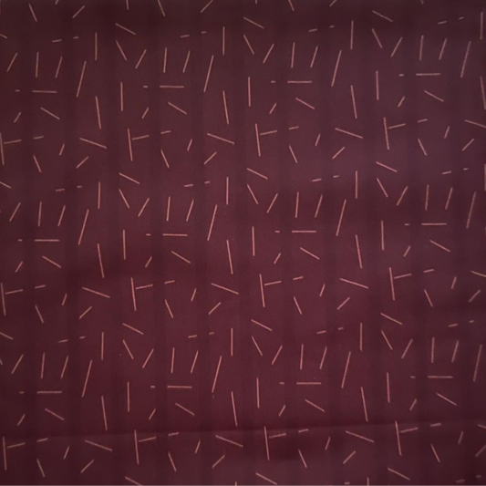 Patterned fabric swatch on a beige background