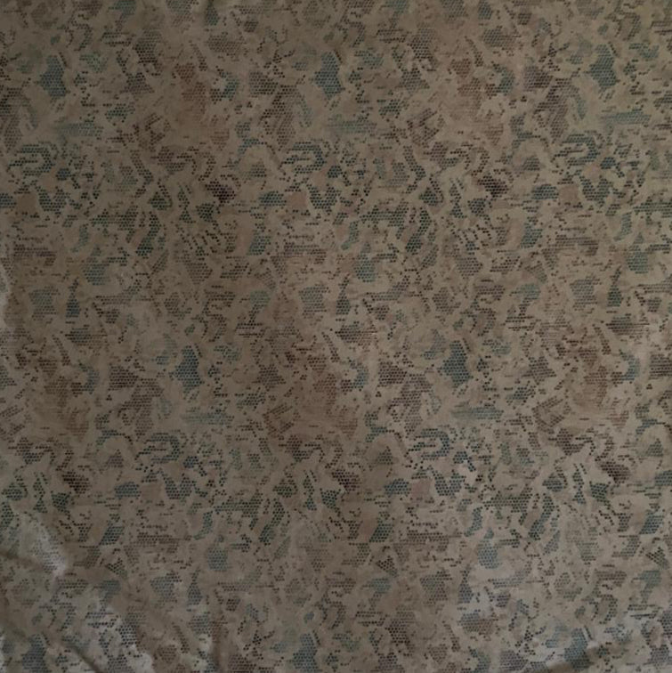 Folded Multi-Tone Abstract Digital Print Cotton Fabric, showing a fragmented pattern, ideal for sustainable men's shirts, dresses, and modern home decor.