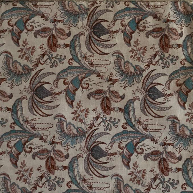 Folded Cream and Teal Paisley Bird Digital Print Cotton Fabric, showing intricate motifs, ideal for sustainable dresses, men's shirts, and charming home decor.