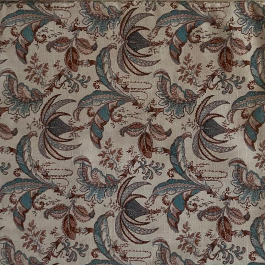 Folded Cream and Teal Paisley Bird Digital Print Cotton Fabric, showing intricate motifs, ideal for sustainable dresses, men's shirts, and charming home decor.