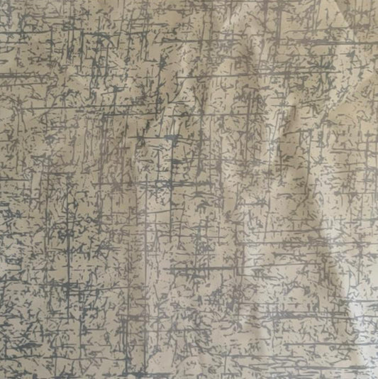 Folded White and Grey Abstract Line Digital Print Cotton Fabric, showing a distressed textured pattern, ideal for sustainable men's shirts, dresses, and modern home decor.