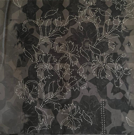 Folded Grey Abstract and White Dashed Floral Digital Print Cotton Fabric, showing a unique layered pattern, ideal for sustainable dresses, men's shirts, and modern home decor.