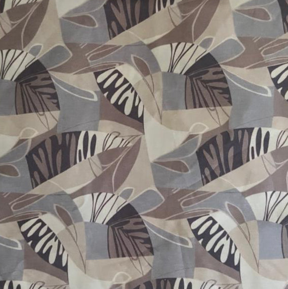 Folded Muted Tones Abstract Segmented Leaf Digital Print Cotton Fabric, showing modern geometric botanical patterns, ideal for sustainable dresses, men's shirts, and contemporary home decor.